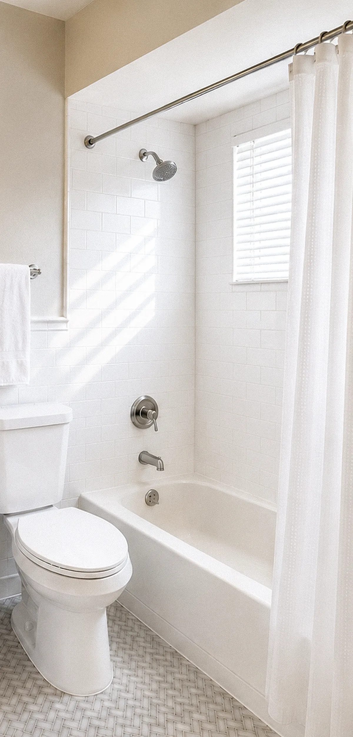 Renovated Signature bathroom with tub, shower and white tile