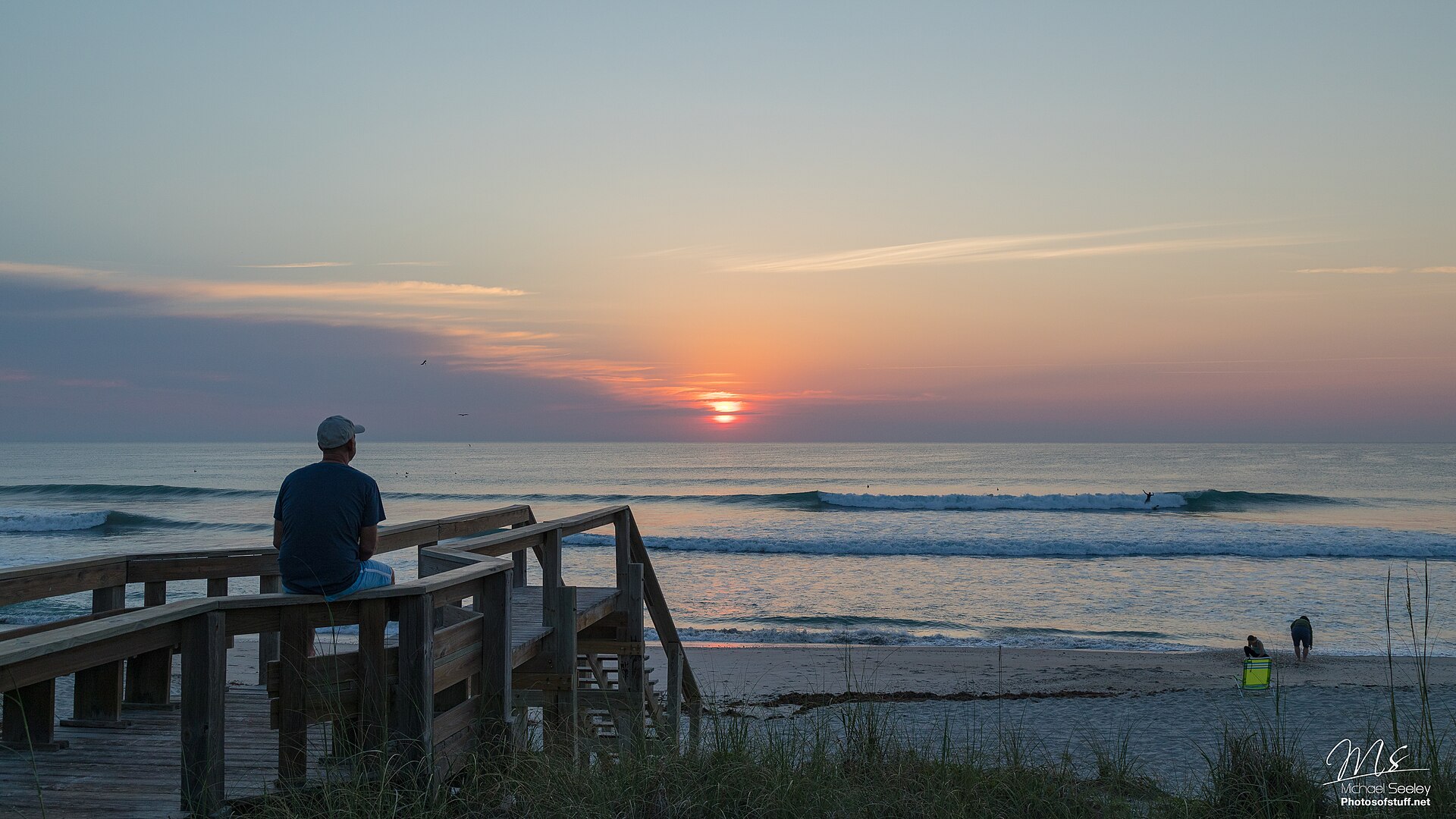 Sunrise over the ocean from a dune crossover in Satellite Beach